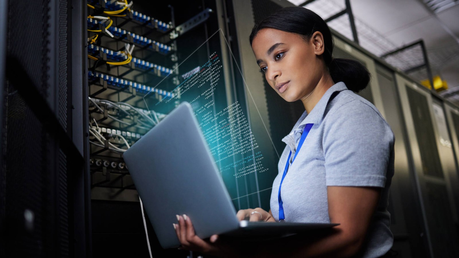 datecenter-worker-looking-at-laptop.jpg